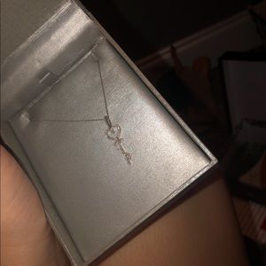 diamond and white gold key pendant necklace
